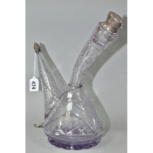 474 - A LATE 19TH/ EARLY 20TH CENTURY SPANISH STYLE PORRON DECANTER WITH WHITE METAL MOUNTS, the stopper w... 