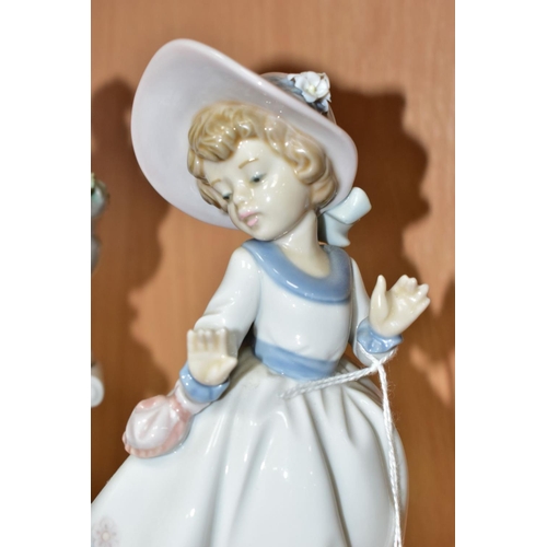 480 - A LLADRO FIGURE GROUP AND A LLADRO FIGURE, comprising A Stitch In Time, no.5344, sculpted by Regino ... 