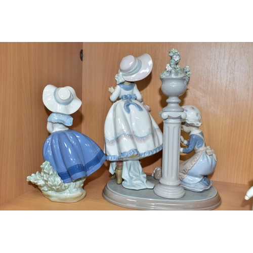 480 - A LLADRO FIGURE GROUP AND A LLADRO FIGURE, comprising A Stitch In Time, no.5344, sculpted by Regino ... 