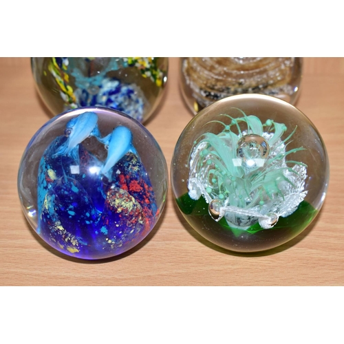 482 - SIX MODERN GLASS PAPERWEIGHTS ALL WITH COLOURED GLASS INCLUSIONS, one by Selkirk Glass titled and da... 