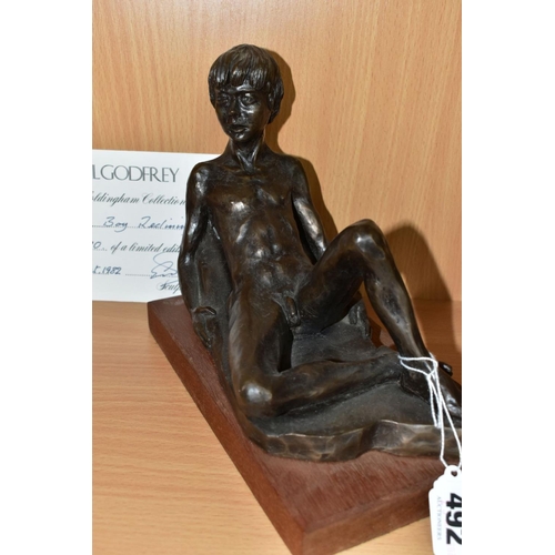 492 - NEIL GODFREY (B. 1937) 'THE WOLDINGHAM COLLECTION - BOY RECLINING' BRONZED RESIN LIMITED EDITION SCU... 