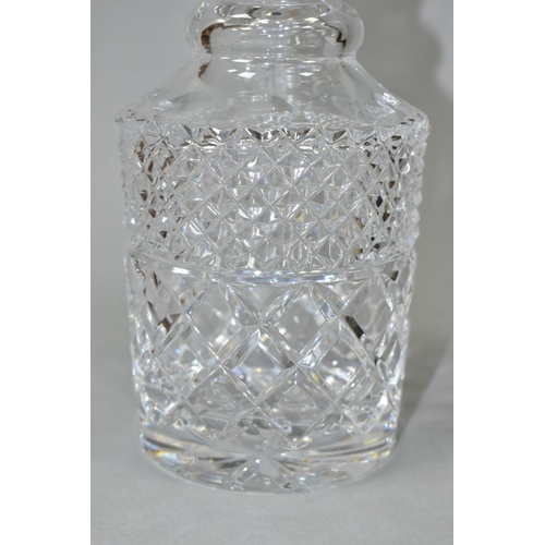 493 - A MODERN CLEAR GLASS DECANTER WITH HALLMARKED SILVER COLLAR, circular stopper, double ring neck abov... 