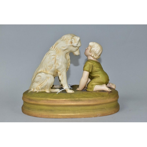 513 - A ROYAL DUX FIGURE OF A BABY AND A SEATED DOG ON AN OVAL BASE INDISCTINCTLY STAMPED 'CAN'T YOU TALK'... 