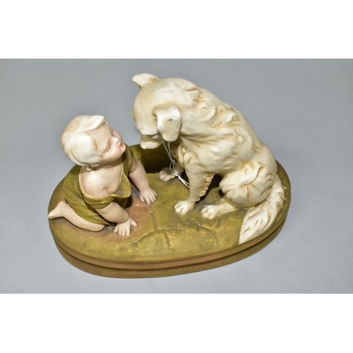 513 - A ROYAL DUX FIGURE OF A BABY AND A SEATED DOG ON AN OVAL BASE INDISCTINCTLY STAMPED 'CAN'T YOU TALK'... 