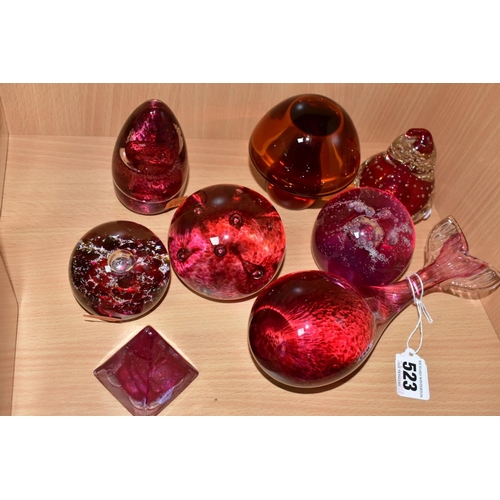 523 - EIGHT MODERN GLASS PAPERWEIGHTS, PRIMARILY CRANBERRY AND RUBY IN COLOUR, including a Wedgwood whale,... 