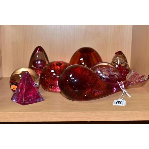 523 - EIGHT MODERN GLASS PAPERWEIGHTS, PRIMARILY CRANBERRY AND RUBY IN COLOUR, including a Wedgwood whale,... 