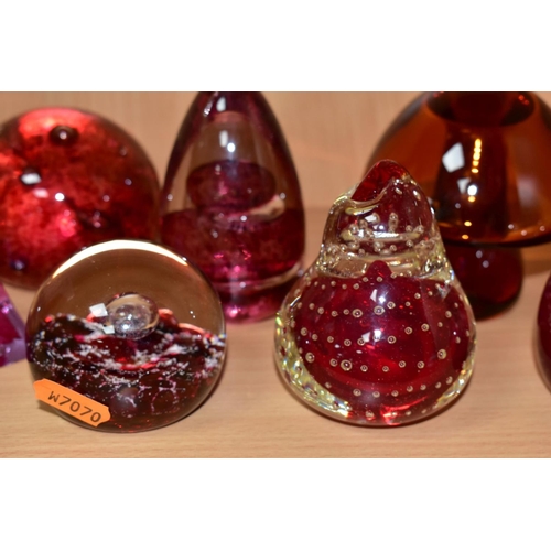 523 - EIGHT MODERN GLASS PAPERWEIGHTS, PRIMARILY CRANBERRY AND RUBY IN COLOUR, including a Wedgwood whale,... 