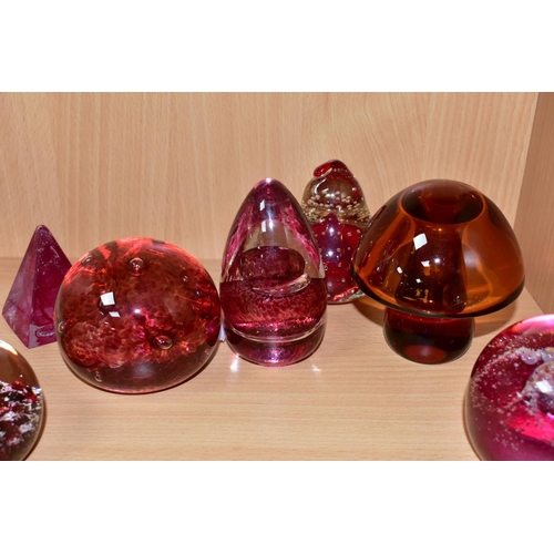 523 - EIGHT MODERN GLASS PAPERWEIGHTS, PRIMARILY CRANBERRY AND RUBY IN COLOUR, including a Wedgwood whale,... 