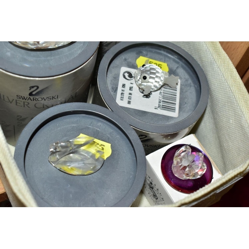 525 - SEVEN BOXED SWAROVSKI CRYSTAL ITEMS, comprising mini Blowfish 013960, Crystal Memories bell and ink ... 