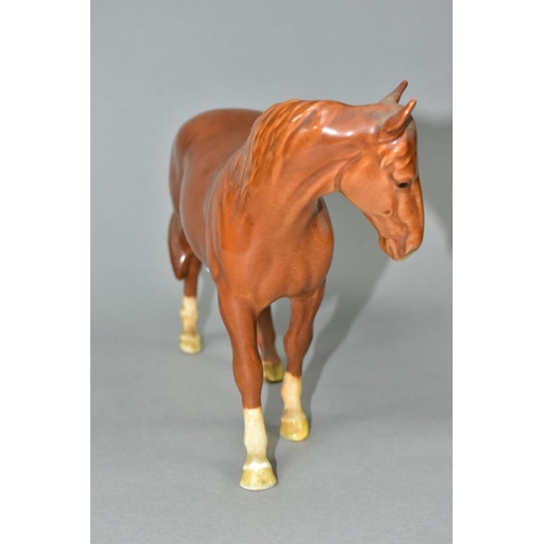 534 - A BESWICK MARE FACING LEFT IN CHESTNUT GLOSS, model no.976 (Condition report: both ears have been da... 