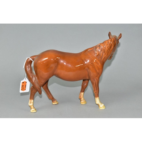 534 - A BESWICK MARE FACING LEFT IN CHESTNUT GLOSS, model no.976 (Condition report: both ears have been da... 