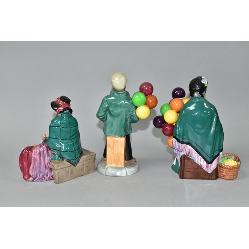 541 - THREE ROYAL DOULTON FIGURES, comprising 'The Old Balloon Seller' HN1315, 'Silks and Ribbons' HN2017 ... 