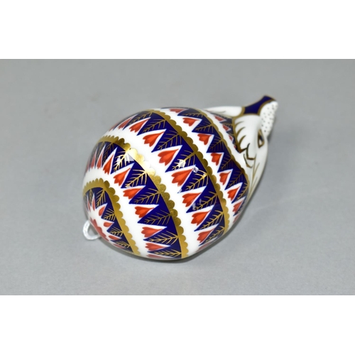 551 - A ROYAL CROWN DERBY HEDGEHOG PAPERWEIGHT, with red, blue and gold Imari pattern and long snout, havi... 