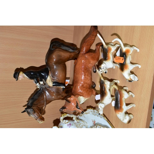 554 - A BESWICK HUNTSWOMAN, HOUNDS AND FOX FIGURES, comprising Huntswoman on Brown Horse 1730 height 21cm,... 