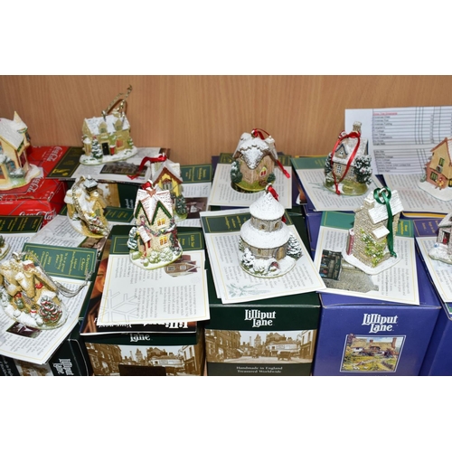 557 - EIGHTEEN BOXED CHRISTMAS THEMED LILLIPUT LANE SCULPTURES, comprising sixteen Christmas Annual Orname... 