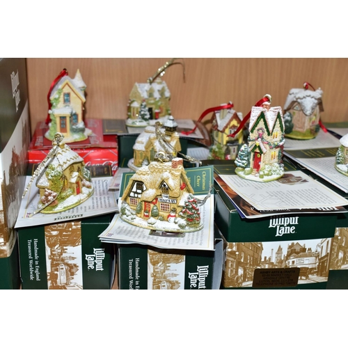 557 - EIGHTEEN BOXED CHRISTMAS THEMED LILLIPUT LANE SCULPTURES, comprising sixteen Christmas Annual Orname... 