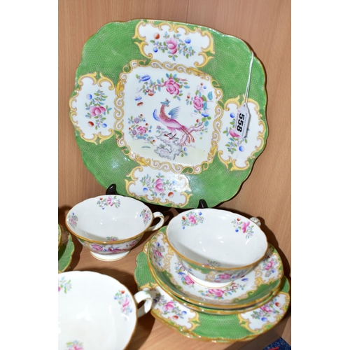 558 - A NINETEEN PIECE MINTONS 'GREEN COCKATRICE' PATTERN TEA SET, pattern 4863, comprising a cake plate, ... 