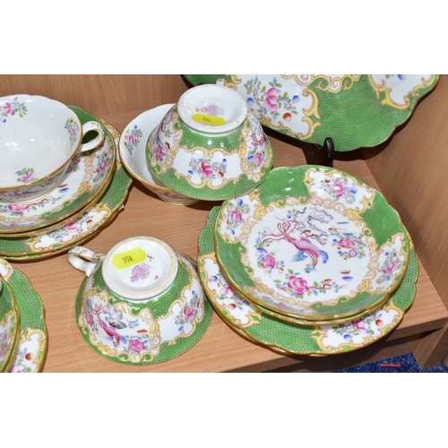 558 - A NINETEEN PIECE MINTONS 'GREEN COCKATRICE' PATTERN TEA SET, pattern 4863, comprising a cake plate, ... 