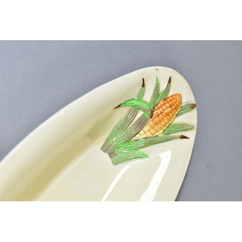 559 - A CLARICE CLIFF FOR NEWPORT POTTERY 'CORN COB' DISH, of oval form, length 25cm, width 11cm, with rel... 