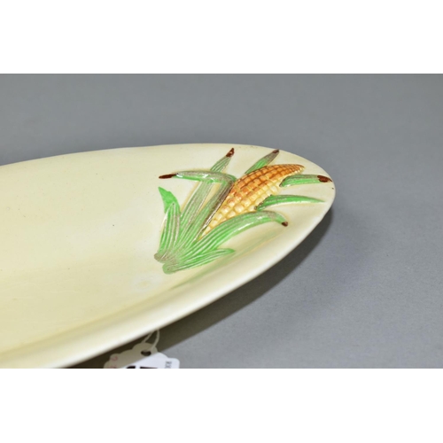 559 - A CLARICE CLIFF FOR NEWPORT POTTERY 'CORN COB' DISH, of oval form, length 25cm, width 11cm, with rel... 