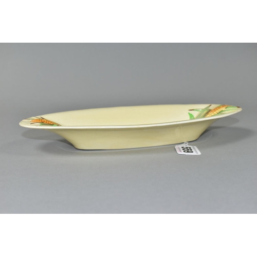 559 - A CLARICE CLIFF FOR NEWPORT POTTERY 'CORN COB' DISH, of oval form, length 25cm, width 11cm, with rel... 