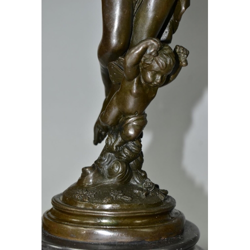 562 - TWO BOXED REPRODUCTION BRONZES OF FEMALE NUDES, one with a cherub, on marble style plinths, tallest ... 