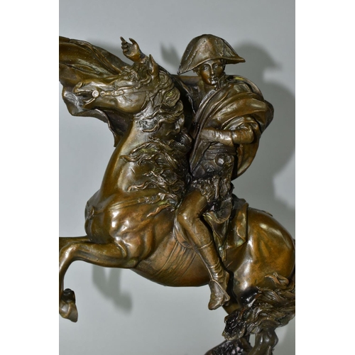 563 - A BOXED REPRODUCTION BRONZE OF NAPOLEON ON HORSEBACK, on a marble style plinth, approximate height 2... 