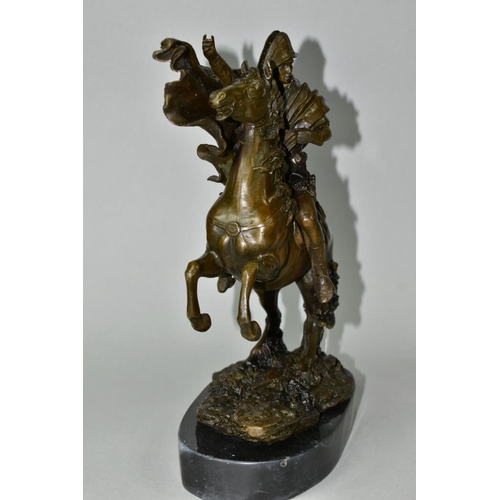 563 - A BOXED REPRODUCTION BRONZE OF NAPOLEON ON HORSEBACK, on a marble style plinth, approximate height 2... 