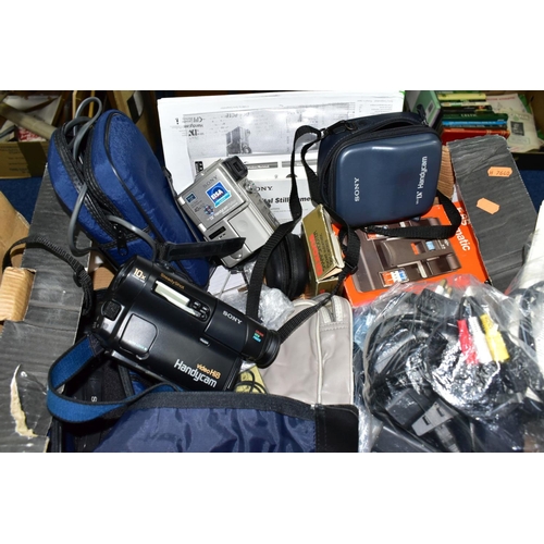 580 - TWO BOXES CONTAINING DIGITAL, FILM AND VIDEO CAMERAS AND EQUIPMENT including a Canon Ixus 220HS in b... 