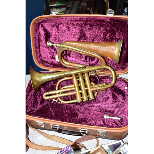 582 - A CASED LAFLEUR BRASS CORNET Serial No 658000 (brass is tarnished, one valve doesn't return and spit... 