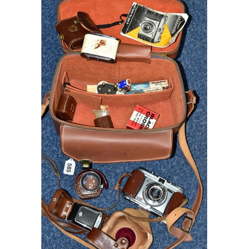 585 - A CAMERA BAG CONTAINING A KODAK RETINETTE FILM CAMERA, a Sun tele converter, Voigtander Rangefinder,... 