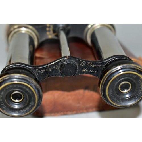 597 - A PAIR OF 14X MAGNIFICATION BINOCULARS BY LLOYD OPTICIAN OF BOSTON, the leather to one barrel has be... 