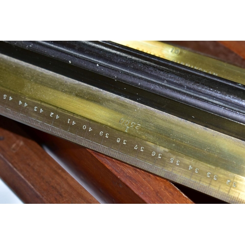 598 - A LATE 19TH CENTURY MAHOGANY CASED BRASS AND BLACK LACQUERED PARALLEL ROLLING RULE, stamped 'R. BAIL... 