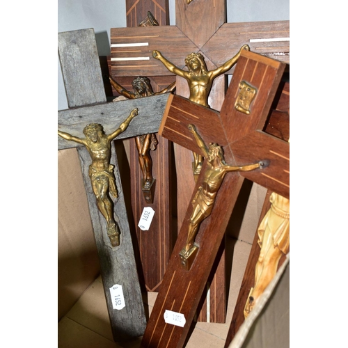 611 - SIX WOODEN CRUCIFIXES WITH METAL AND RESIN CHRIST FIGURES, approximate height of tallest 35cm