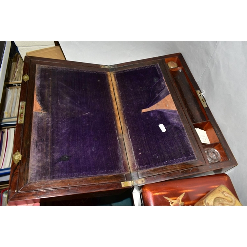 613 - A ROSEWOOD WRITING SLOPE WITH MOTHER OF PEARL INLAY TO THE LID, lid missing from one ink well, felt ... 