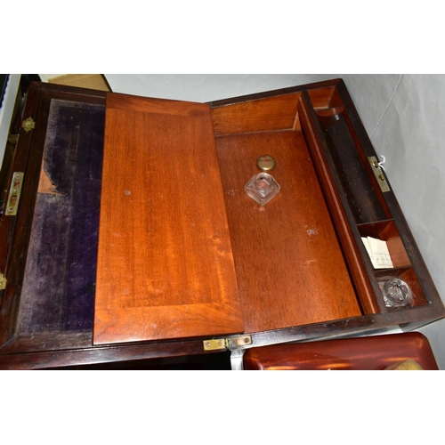 613 - A ROSEWOOD WRITING SLOPE WITH MOTHER OF PEARL INLAY TO THE LID, lid missing from one ink well, felt ... 