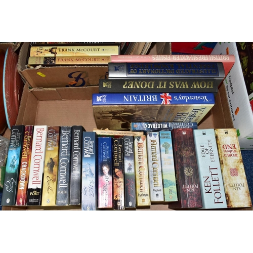 632 - BOOKS & MAGAZINES, a collection of approximately fifty hardback and paperback titles in four boxes, ... 