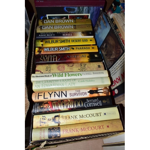 632 - BOOKS & MAGAZINES, a collection of approximately fifty hardback and paperback titles in four boxes, ... 