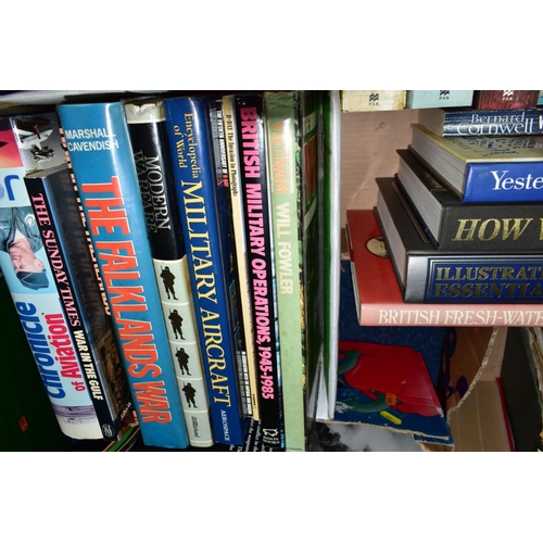 632 - BOOKS & MAGAZINES, a collection of approximately fifty hardback and paperback titles in four boxes, ... 