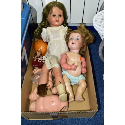 651 - A BOX AND A DOLL'S PRAM OF DOLLS AND SOFT TOYS, comprising a white painted wicker doll's pram height... 