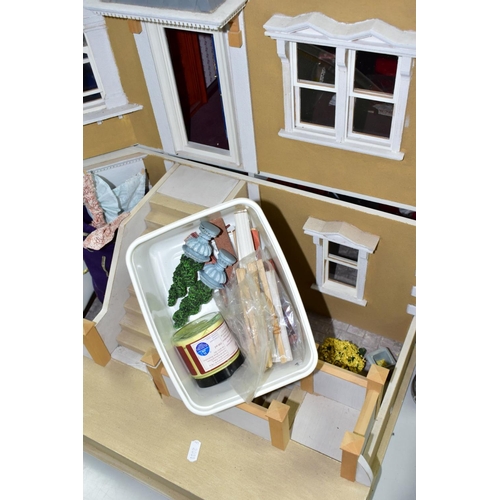 657 - A LARGE MODERN WOODEN DOLLS HOUSE, modelled as a two storey Georgian style house with basement and a... 