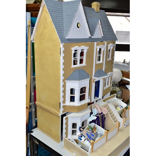 657 - A LARGE MODERN WOODEN DOLLS HOUSE, modelled as a two storey Georgian style house with basement and a... 