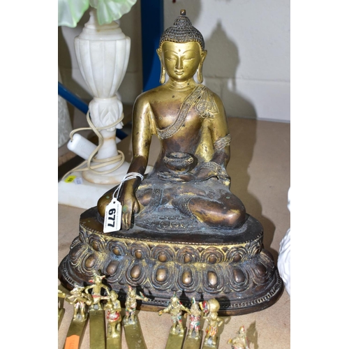 677 - A GILT BRONZE FIGURE OF BUDDHA AND OTHER FIGURES, comprising Buddha figure in traditional seated pos... 