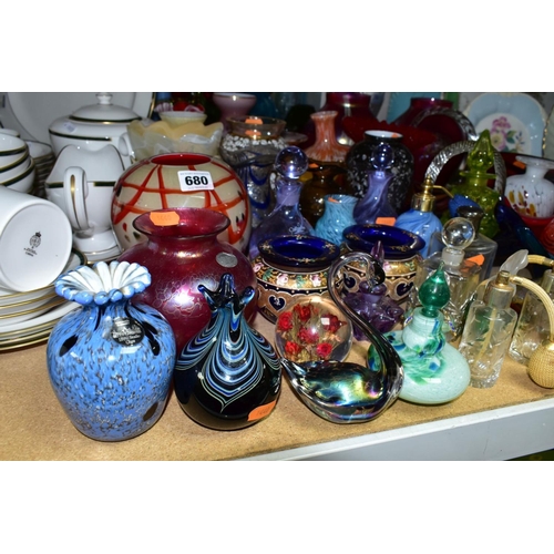 680 - A LARGE GROUP OF COLOURED GLASSWARES, approximately fifty pieces to include a boxed Fenton green pea... 