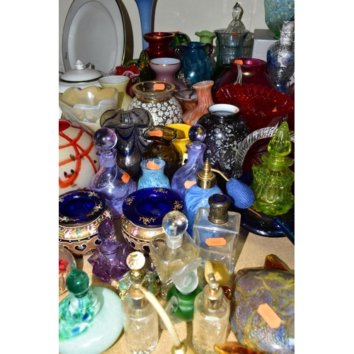 680 - A LARGE GROUP OF COLOURED GLASSWARES, approximately fifty pieces to include a boxed Fenton green pea... 