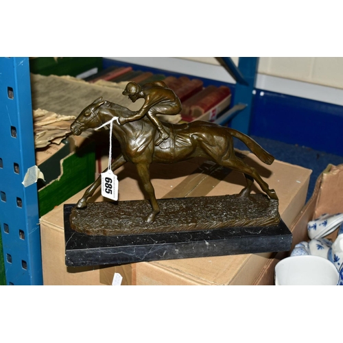 685 - A BOXED REPRODUCTION BRONZE OF A RACEHORSE AND JOCKEY on a marble style plinth, approximately 21cm x... 