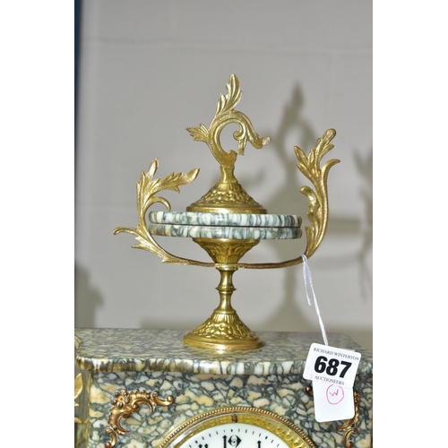 687 - AN EARLY 20TH CENTURY SPECKLED GREY MARBLE AND GILT METAL MANTEL CLOCK, urn surmount, foliate side h... 