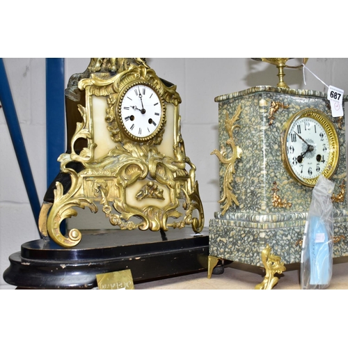 687 - AN EARLY 20TH CENTURY SPECKLED GREY MARBLE AND GILT METAL MANTEL CLOCK, urn surmount, foliate side h... 