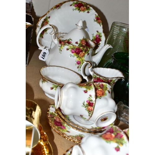 697 - A TWENTY TWO PIECE ROYAL ALBERT OLD COUNTRY ROSES TEA SET, comprising a handled cake plate, a teapot... 