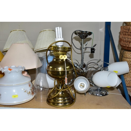 702 - DECORATIVE HOUSEHOLD LIGHTING, comprising matching chrome ceiling and wall lights, brass oil lamp co... 